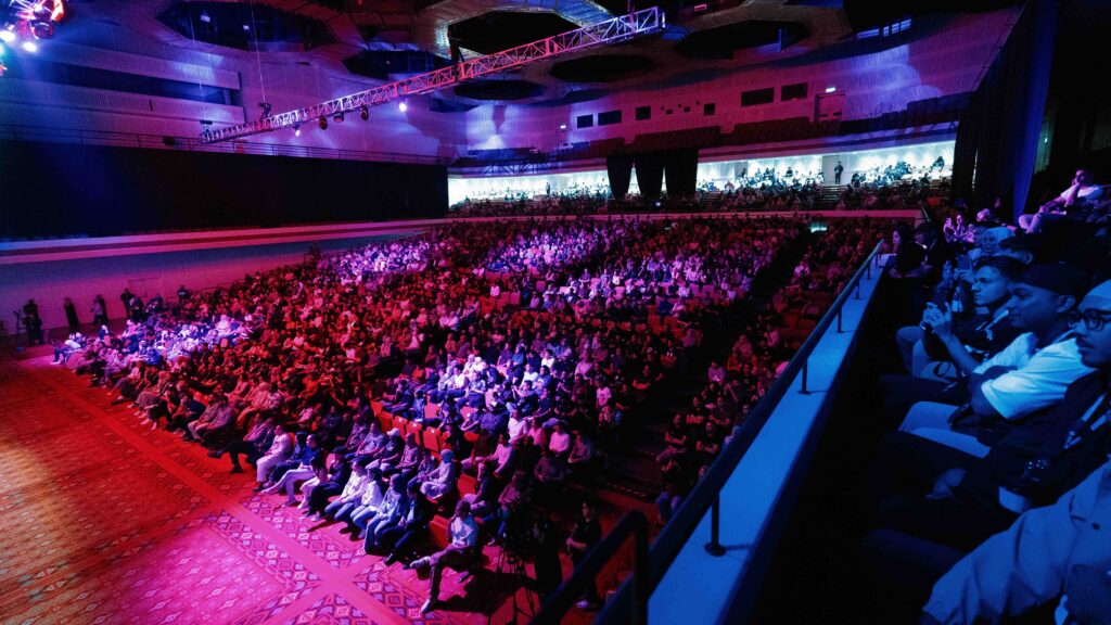 Wide angle view of the audience for his talk, The Path of A Champion. 